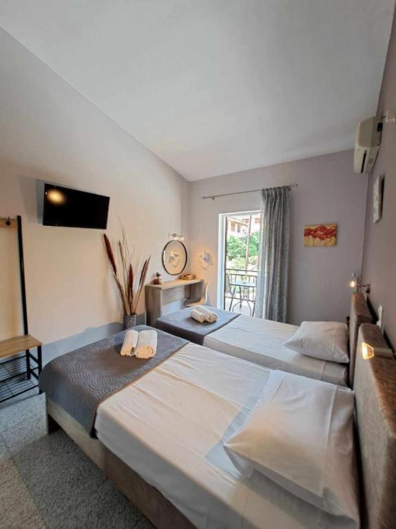 Ilias Apartments Ipsos Bagian luar foto