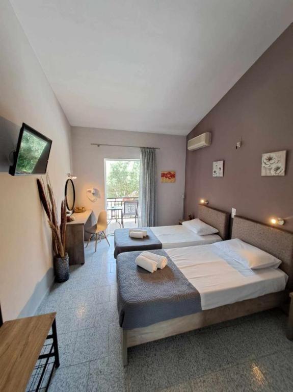 Ilias Apartments Ipsos Bagian luar foto